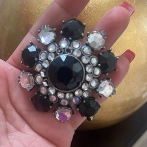Black and white flower brooch